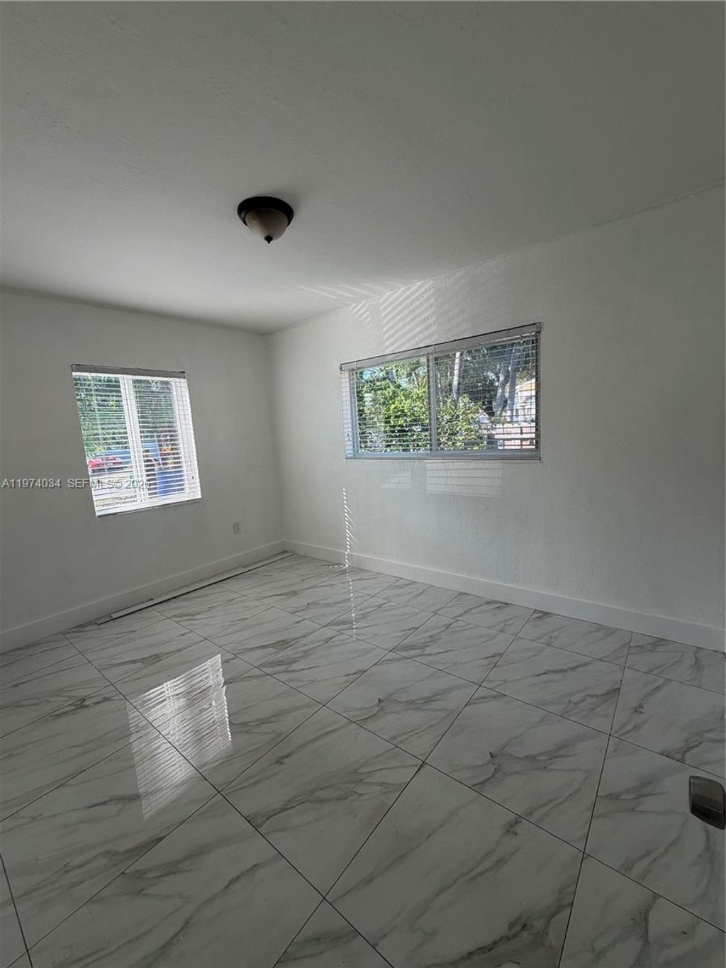 Photo of 7001 NW 6th Ave, Miami, FL 33150 (MLS # A11974034)