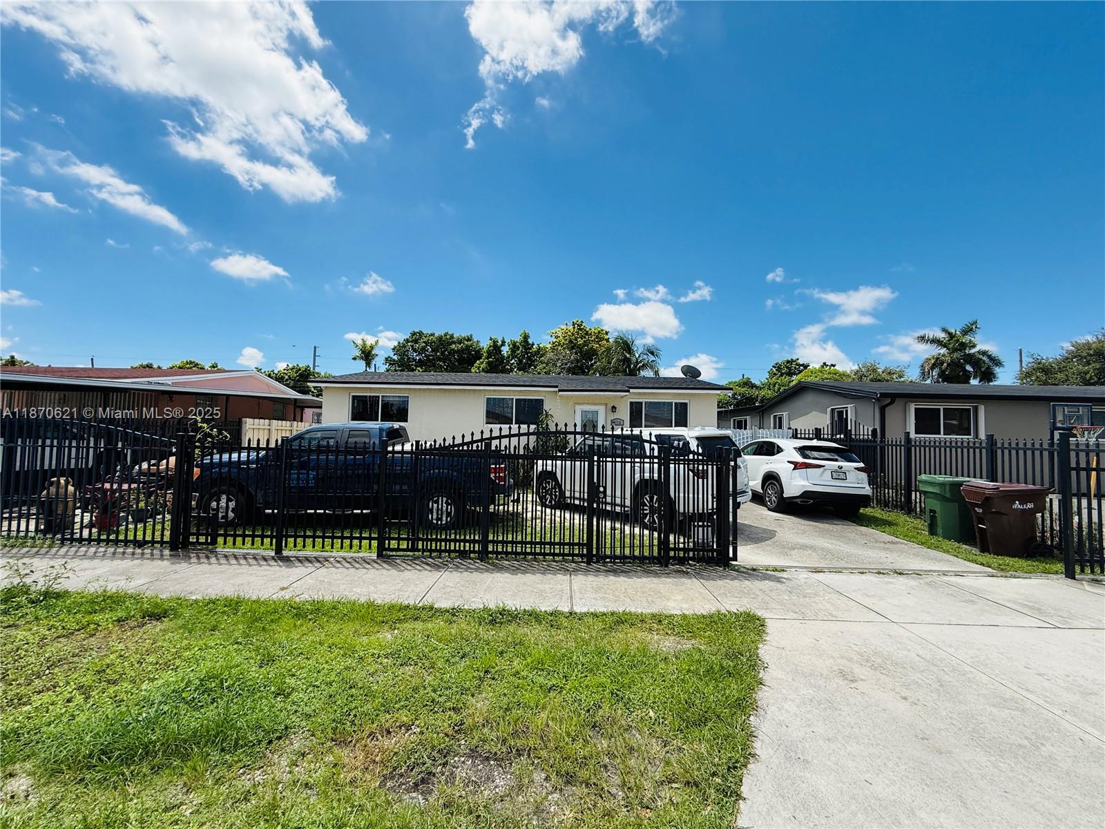 Discover this beautifully maintained 3-bedroom, 1.5-bathroom residence nestled in the heart of Hialeah. The home features an updated kitchen with sleek countertops and modern appliances, perfect for family gatherings and entertaining guests. Enjoy the convenience of a washer and dryer right at home, along with impact windows and doors that enhance security and energy efficiency. The roof is only five years old, offering peace of mind and added durability. Step outside to a large, fenced yard on nearly 8,000 square feet of lot, with room for a pool, gardening, or creating your own private oasis. Don't miss this fantastic opportunity to own a move-in-ready home in a desirable neighborhood. Schedule your showing today!