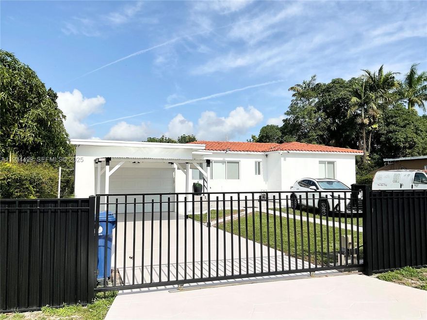 Awesome fully renovated Resort Style home, located in a desirable residential community in Biscayne Gardens (Miami-Dade).  Features include dark brown wood floors and magnificent marble tiles in the bathrooms, beautiful kitchen, top of the line stainless steel appliances with Quartz countertops.  This 3-bedroom, 2 full-bathroom house features new elegant design and newly resurfaced pool deck with gazebo, including 2 outdoor gas kitchens and sink for great barbecues. New modern indoor barn doors, white wood and matte black details. Tile roof is only 5 years old, new air conditioning unit, impact windows and doors, new garage door, cleared and certified septic tank, washer and dryer and security cameras.  Close to Miami Beach, Miami International Airport, Broward, shopping centers, restaurants, supermarkets, schools, and major roads and highways (I-95 and FL Turnpike).  With a large 10,725 Sqf lot, this beautiful house is great for family and friends’ enjoyment and entertainment.