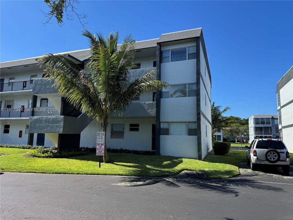 Photo of 8330 Sands Point Blvd #N208, Tamarac, FL 33321 (MLS # A11977044)