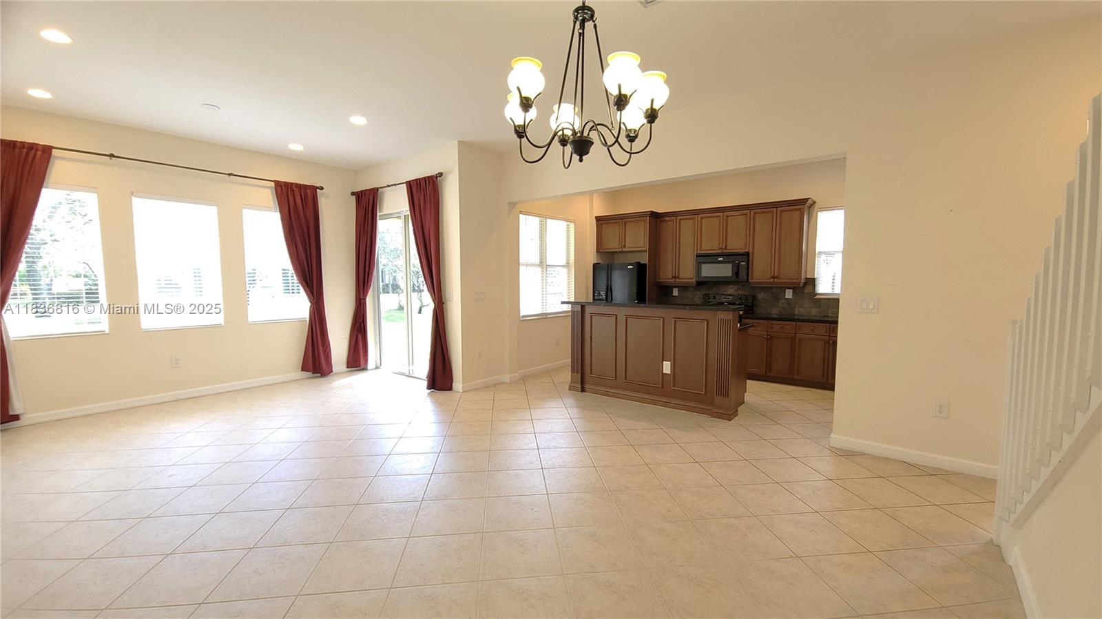 Absolutely beautiful corner townhouse in prestigious Heron Preserve! This spacious 3-bedroom, 2.5-bath home features a den and a 2-car garage. Enjoy upgrades including impact windows, granite countertops, 42” wood cabinets, tile flooring downstairs, and carpet upstairs. The oversized master suite boasts walk-in closets and an additional 11x12 retreat—ideal for a sitting area or home office. Upstairs den can serve as a media room or workspace. Don’t miss this beautifully maintained home in a prime location!