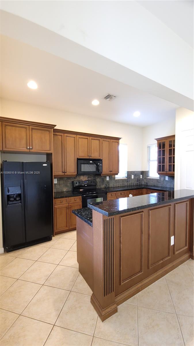 Absolutely beautiful corner townhouse in prestigious Heron Preserve! This spacious 3-bedroom, 2.5-bath home features a den and a 2-car garage. Enjoy upgrades including impact windows, granite countertops, 42” wood cabinets, tile flooring downstairs, and carpet upstairs. The oversized master suite boasts walk-in closets and an additional 11x12 retreat—ideal for a sitting area or home office. Upstairs den can serve as a media room or workspace. Don’t miss this beautifully maintained home in a prime location!