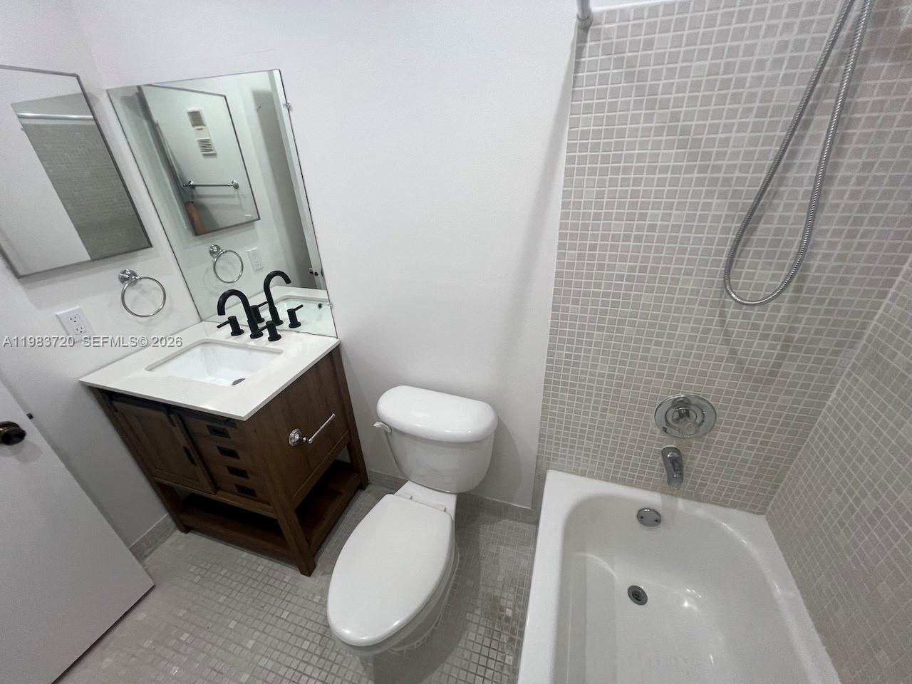 TAMARAC GARDENS CONDOMINI - Residential Lease