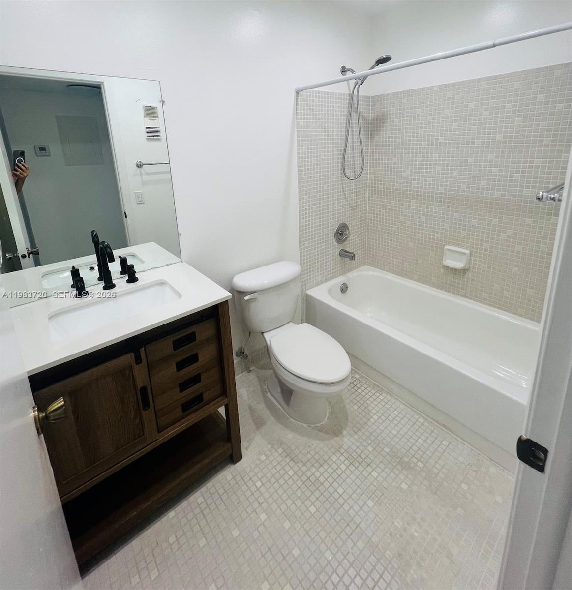 TAMARAC GARDENS CONDOMINI - Residential Lease