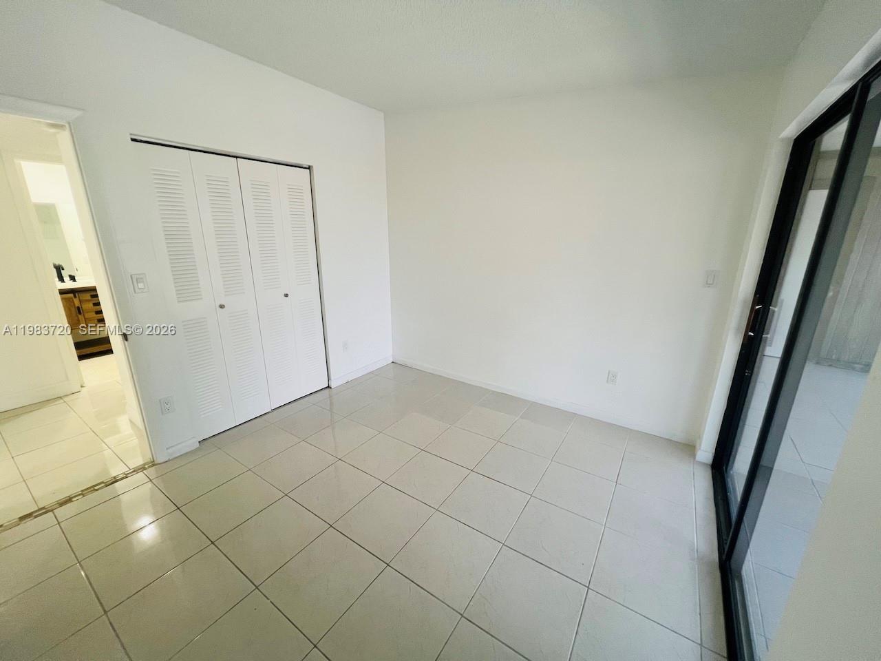 TAMARAC GARDENS CONDOMINI - Residential Lease