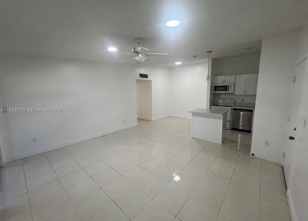 Photo of 9743 W Mcnab Rd #209, Tamarac, FL 33321 (MLS # A11983720)