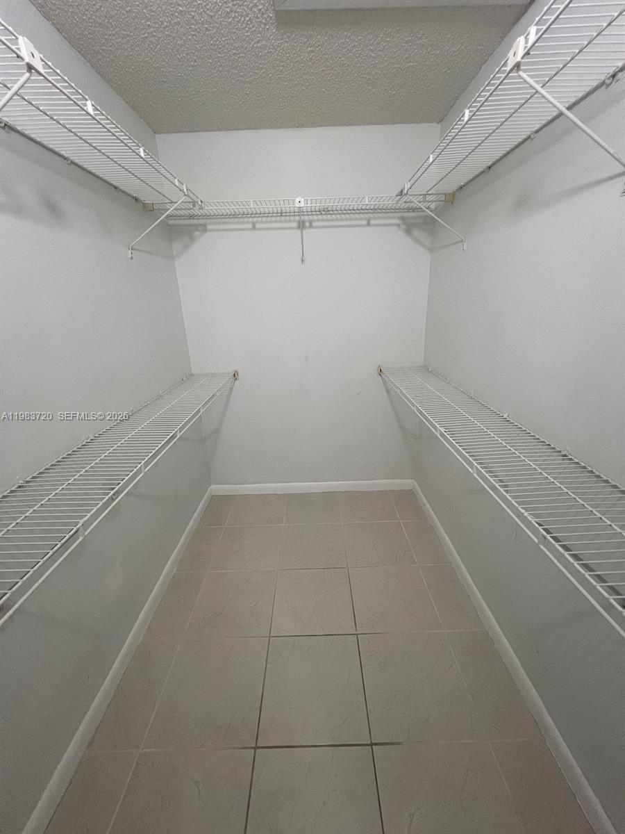 TAMARAC GARDENS CONDOMINI - Residential Lease