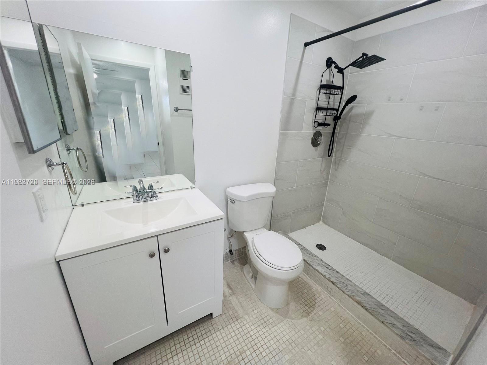 TAMARAC GARDENS CONDOMINI - Residential Lease