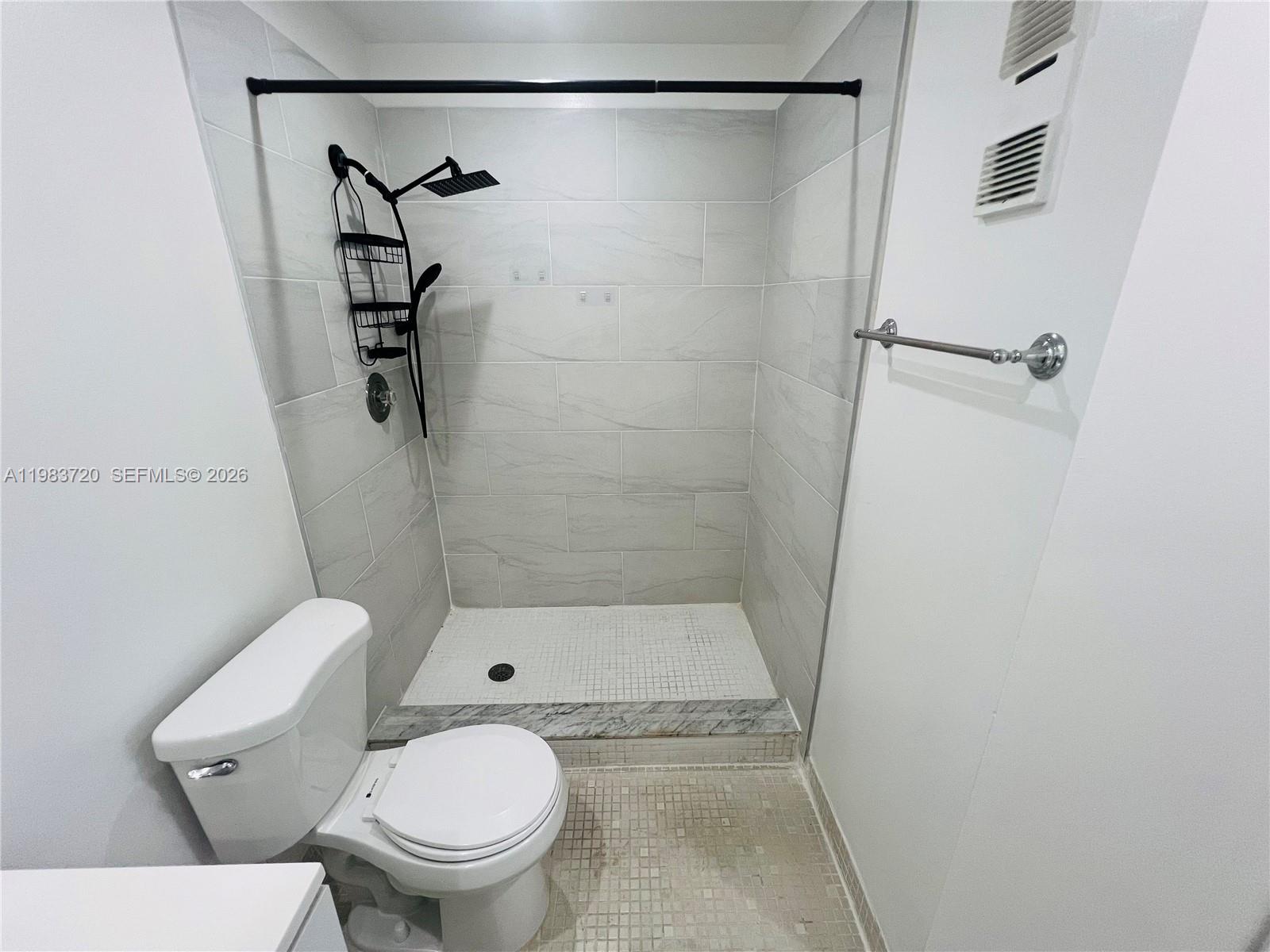 TAMARAC GARDENS CONDOMINI - Residential Lease