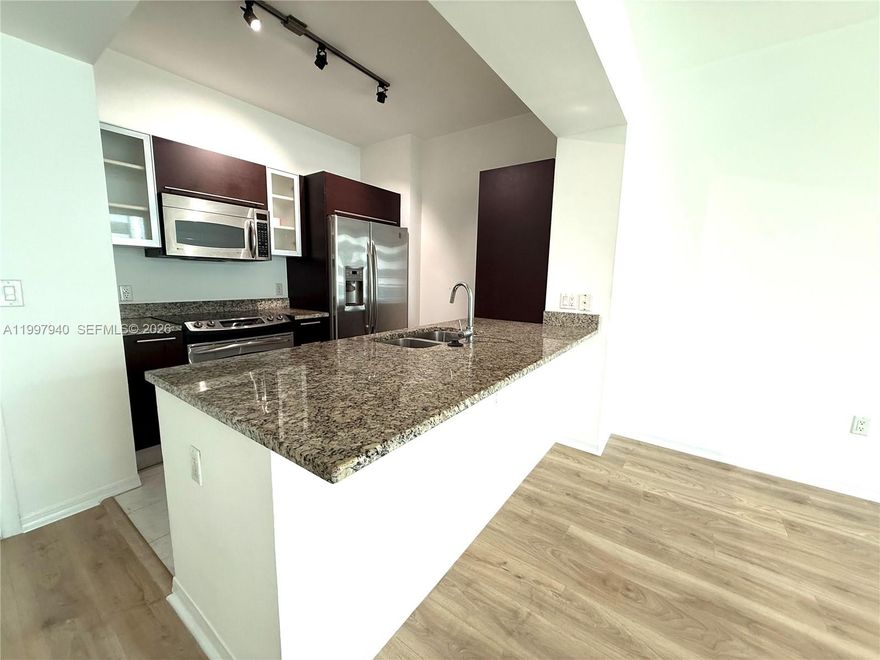 Beautiful 1-bedroom, 1-bathroom residence with city views. Located in the heart of Brickell, this unit features laminated floors, stainless steel appliances, and imported Italian cabinetry.

Enjoy resort-style amenities, including 24-hour security and concierge, valet parking, state-of-the-art fitness centers in each tower, two infinity-edge heated pools, steam room, theater room, business center, party room, and a lounge with pool table.

The unit includes one assigned parking space on the 9th floor. Conveniently located within walking distance to Mary Brickell Village and Brickell City Centre. Water and basic cable and internet are included.