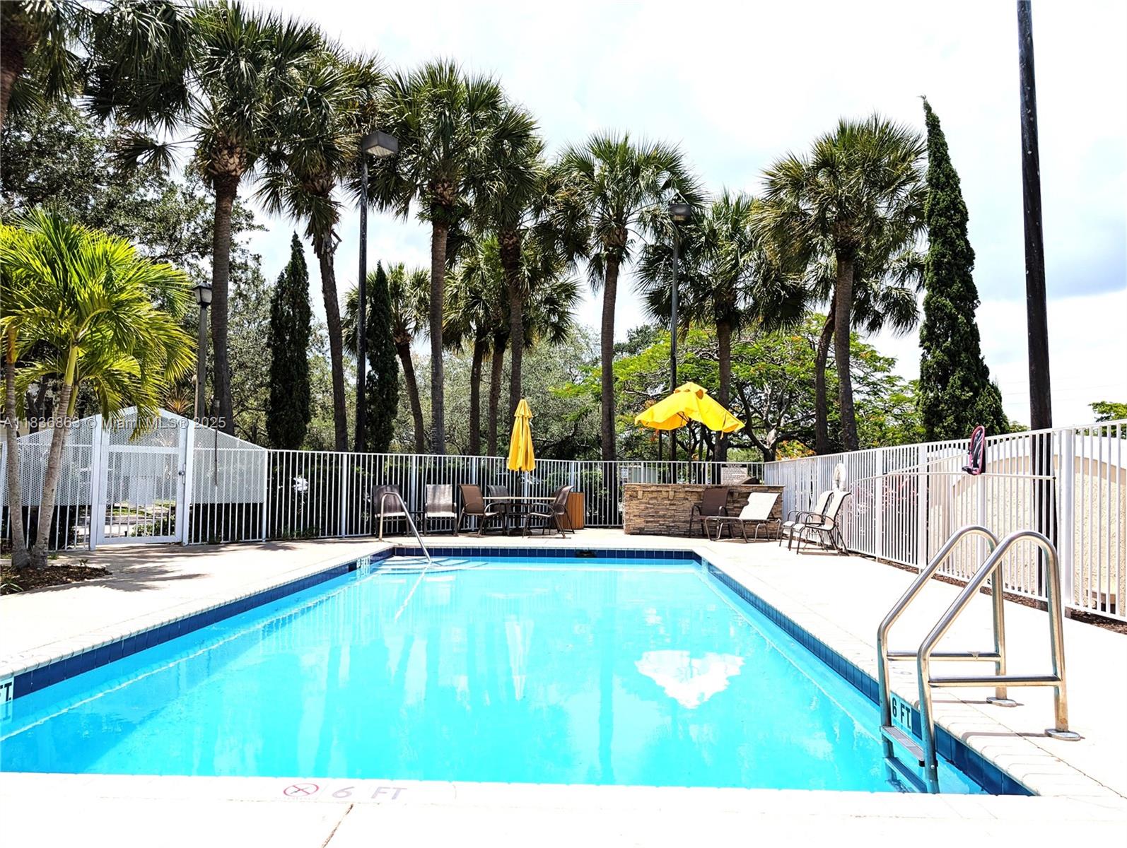 Welcome to this beautifully remodeled 2-bedroom, 1.5-bath townhome in the highly sought-after Somerset at Jacaranda! Nestled in the heart of Plantation, this modern waterfront residence offers a spacious layout with both bedrooms upstairs for added privacy and a convenient powder room on the main level. The updated kitchen features granite countertops, SS appliances, and sleek cabinetry—perfect for cooking & entertaining. Enjoy neutral flooring throughout, updated en-suite baths, in-unit washer & dryer, and complete hurricane protection with IMPACT windows and doors. Relax on your private patio overlooking the serene waterway. Additional storage included. Assigned parking space & plenty of guest parking make life easy. A perfect blend of tranquility and convenience—don't miss this one!