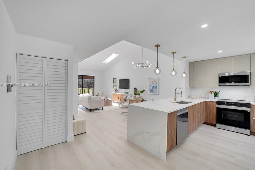 Stunning, beautifully renovated top-floor with sought-after southern exposure and unobstructed golf course & lake views. Located in prestigious Boca Pointe, this residence offers country club living with no mandatory membership. Brand new gourmet kitchen & new appliances. This light-filled home features a bright living space with vaulted ceilings and sjylights briging a lot of additional natural lights. The brand-new open kitchen showcases quartz countertops, modern cabinetry, and new stainless-steel appliances, ideal for both everyday living and entertaining. Enjoy fully updated bathrooms and new flooring throughout creating a fresh, contemporary feel. New AC. Very nice pool into the community. This exceptional home is truly a must-see—schedule your showing today!