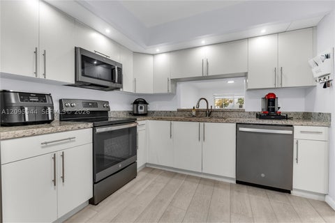 Photo of 12500 SW 5th Ct #210M, Pembroke Pines, FL 33027 (MLS # A12095544)
