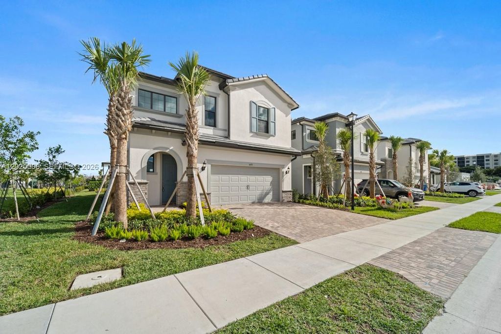 Photo of 4492 Tacoma Park Dr, Oakland Park, FL 33309 (MLS # A12020006)