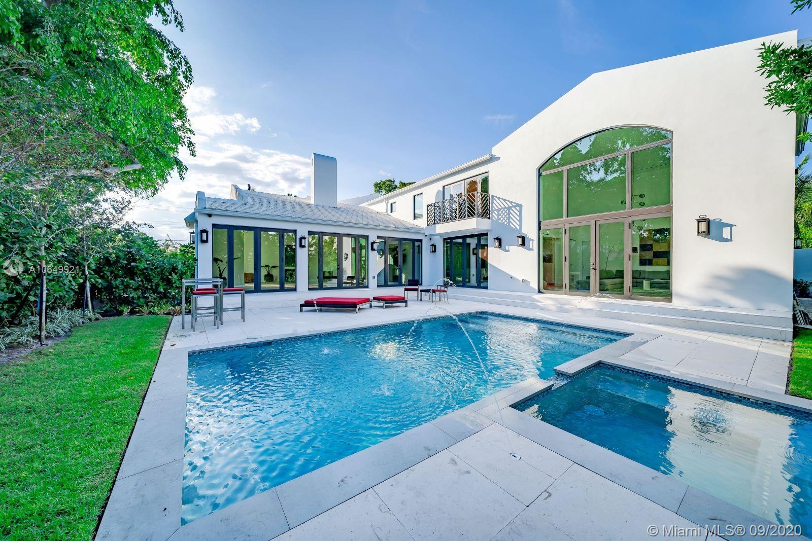 Live the resort life with full amenities without ever leaving home. Experience the sudden disappearance of all your worldly cares. Your welcome! 16 ft. and 18 ft. ceilings in main rooms. The restrained elegance and modern attitude of each flawless finish spills out to several intimate outdoor areas. Scavolini kitchen, custom bathrooms (see additional comments). 6 beds, 6 baths + office with full bath and gym with full bath. Additional outdoor cabana bath. Capable of handling the most robust home automation systems. Bike to the ocean. Walk to houses of worship. 15 minutes to the airport. This large, luminous residence invites in the sunshine and happy times! Created by the vision and dedication to perfection of developer Aurelio Tiné.