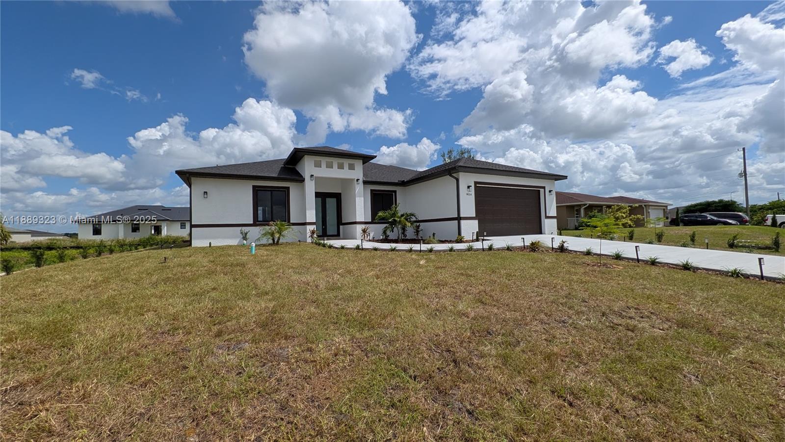 Brand New Home 2025 in LaBelle! Step into this stunning 3BR / 2BA+ DEN, 1,950 sq. ft. home featuring: All-tile floors, quartz countertops & stainless-steel appliances and an open-concept design. Spacious 2-car garage. Covered lanai with tile finishes & ceiling fans. Ceiling fans throughout the home. Dedicated laundry room. Built-in closet organizers. Bright & open spaces with natural light everywhere. Large bedrooms designed for comfort & family living Upgrades come standard—combining elegance, functionality, and quality. Prime location near schools, shopping, and just 30 minutes to Lehigh Acres, Fort Myers & Cape Coral. Don’t wait—this growing community is in high demand! Schedule your private showing today!