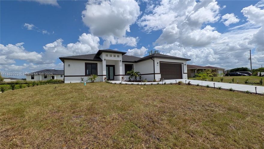 Brand New Home 2025 in LaBelle! Step into this stunning 3BR / 2BA+ DEN, 1,950 sq. ft. home featuring: All-tile floors, quartz countertops & stainless-steel appliances and an open-concept design. Spacious 2-car garage. Covered lanai with tile finishes & ceiling fans. Ceiling fans throughout the home. Dedicated laundry room. Built-in closet organizers. Bright & open spaces with natural light everywhere. Large bedrooms designed for comfort & family living Upgrades come standard—combining elegance, functionality, and quality. Prime location near schools, shopping, and just 30 minutes to Lehigh Acres, Fort Myers & Cape Coral. Don’t wait—this growing community is in high demand! Schedule your private showing today!