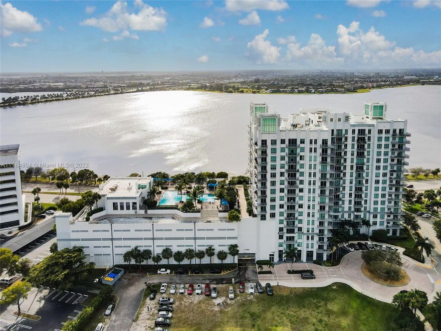 RARELY AVAILABLE PENTHOUSE - New York Loft Style Penthouse in West Palm Beach with breathtaking sunset and lake views. Gorgeous Modern City Living with full-size washer & dryer, exposed concrete ceilings, 12-foot ceilings with floor to ceiling impact glass. Open kitchen with cherry wood cabinets, stainless steel appliances, granite countertops with tiled backsplash. Modern light fixtures, newer water heater, and washer/dryer. The Edge is a pet-friendly building in Downtown West Palm Beach, with 24 hr concierge lobby, clubhouse, gym, yoga room, a pool with views of Clear Lake & Downtown. Association allows rentals 12 Times per Year with a 1-month minimum term. This penthouse unit includes a deeded climate-controlled storage unit. Do NOT miss your opportunity to own this Penthouse!