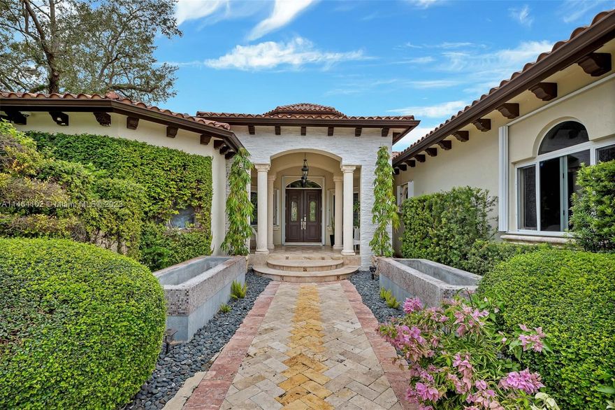 Welcome to your dream home in the heart of Pinecrest, where tropical paradise meets modern luxury living.This magnificent 4-bedroom, 6.5-bath residence has been meticulously renovated to offer the ultimate in comfort and style. The home features a river-style pool that meanders through lush tropical landscaping, with a convenient cabana bathroom nearby for your outdoor enjoyment. A built-in BBQ and tiki hut. Inside, discover a gourmet kitchen, spacious living areas with abundant natural light, high ceilings, a formal dining room, a home office, and not one but two master bedrooms, each with its walk-in closet. One of the two car garages was converted into a bedroom with a bath, & can easily be converted back. Statute by the pool does not convey.