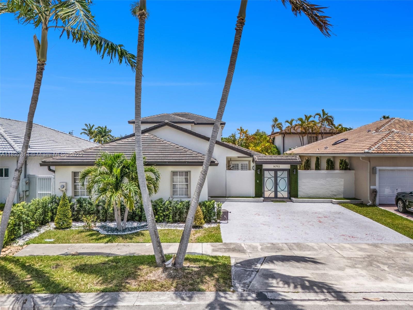 Luxury 4-bedroom, 3-bath single-family home for rent in the desirable Miami Lakes area. This spacious residence features an open layout, formal living and dining areas, and a beautifully upgraded kitchen with stainless steel appliances and granite countertops. Enjoy indoor-outdoor living with a private backyard oasis, complete with a large Heated pool and covered patio—perfect for entertaining.
Additional features include a two-car garage, laundry, and generously sized bedrooms including a primary and junior suite with a walk-in closet and ensuite bath. Located on a quiet residential street with no HOA, offering flexibility and privacy. Close to top-rated schools, parks, shopping, and major highways.