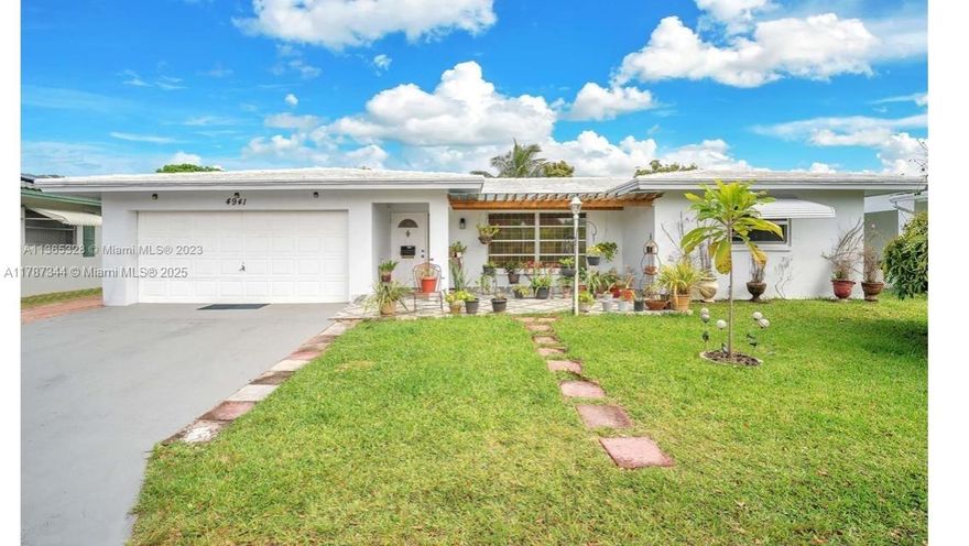 Spacious and totally renovated 2 bedrooms, 2 bathrooms single family home in Mainlands of Tamarac Lake. This Beautiful home features knockdown ceilings, 32X32 white glass porcelain Italian tiles, an open concept with an island kitchen with double cabinetry which provides lots of space, quartz countertops and new 42" wooden cabinets. 2021 30" range-E with 48" Air Hood vent to outside the house, newer stainless-steel appliances and high efficiency washer and dryer. Impact glass windows and doors. 4 tons A/C 2019, 2018 Water Heater, automatic sprinkler system with water supply from the lake. The community is verified as a 55 and older community.