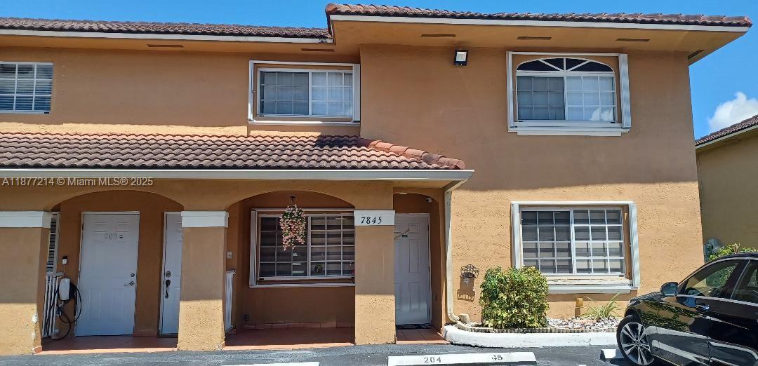 Strategically located beautiful large 2/2 corner unit with n0 neighbors on one side. Indoor laundry room with washer and dryer. Nice screened in patio, excellent for entertaining. Outdoor storage shed. Impact windows and shutters. Close to shopping center. Includes 2 assigned parking spaces per unit and guest parking.