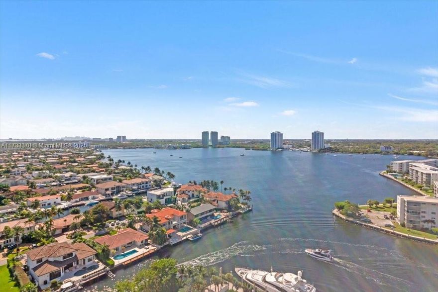 SPECTACULAR PANORAMIC VIEWS FROM THIS HIGH FLOOR FULLY RENOVATED CONTEMPORARY HOME IN THE SKY FEATURING 36" PORCELAIN TILE FLOORS THROUGHOUT, MODERN KITCHEN W/STAINLESS STEEL APPLIANCES, WALK IN CLOSETS, EXTRA LARGE PRIMARY BEDROOM WITH PRIVATE BALCONY, & UPDATED BATHROOMS.  READY TO MOVE IN!! LIVE IN PRESTIGIOUS WILLIAMS ISLAND WITH FULL AMENITIES:  15 TENNIS COURTS, 4 PICKLE BALL COURTS, 3 RESTAURANTS, STATE OF THE ART SPA, MARINA, WALK/JOG PATH, KIDS PLAYGROUND, COURTESY BUS, WALK TO HOUSES OF WORSHIP AND SO MUCH MORE....