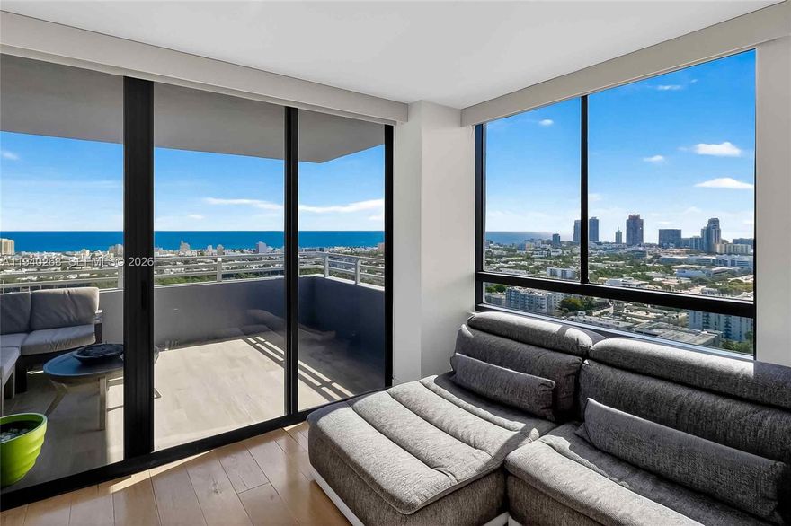 Wake up to sweeping views of the ocean and the Miami Beach skyline from this sun-filled corner residence in the heart of West Avenue. This charming 2-bedroom, 2-bath home blends effortless coastal living with thoughtful modern upgrades, creating a space that feels both refined and relaxed.

The fully updated kitchen features top-of-the-line appliances and custom cut marble waterfall countertops—perfect for quiet mornings or entertaining at sunset. Both the primary en-suite and guest bathrooms have been beautifully remodeled, while automatic privacy blinds, a newer AC, and an in-unit washer and dryer add comfort and ease to everyday living. Step outside to an oversized private balcony and take in the city, sky, and sea.

Set within a full-service, bayfront building offering 24-hour front desk and valet, residents enjoy resort-style amenities including a waterfront fitness center, bayside pool, tennis court, putting green, outdoor kitchens, and sunset gardens overlooking the bay. Assigned parking on the second floor adds convenience.

Just moments from Lincoln Road, some of the top restaurants, Whole Foods and Trader Joe's—this is South Beach living at its most effortless and inspired. A Must See!