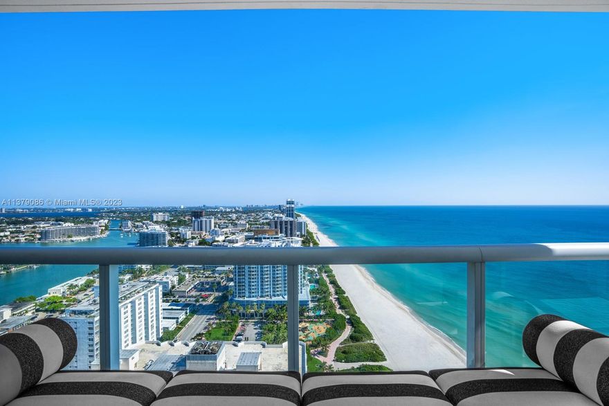 Exceptional luxury oceanfront sky residence. This gorgeous three bedroom corner home on the 35th floor has mesmerizing ocean-to-city views that are truly breathtaking. The unit has been exquisitely updated with designer high end finishes that include ultra-lux state of the art lighting fixtures, contemporary statement chandeliers, touch lighting, all new smart appliances, new motorized shades in every room, new bathroom vanities with touch bluetooth mirrors and cabinets as well as a beautiful newly appointed kitchen. The building is ideally located on a magnificent and quiet stretch of the beach midway between South Beach and Bal Harbour with easy access to Miami, the airport, exclusive golf courses, marinas, performing arts centers, world class restaurants and shopping. A must see!