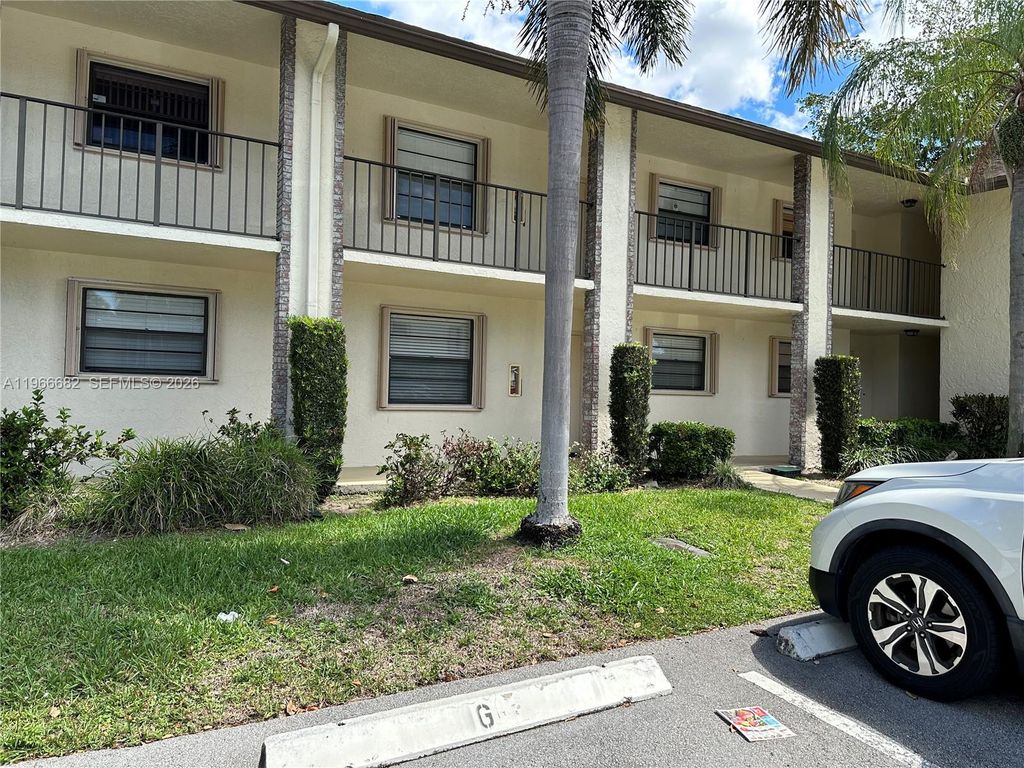 Photo of 23442 Lyons Rd #404, Boca Raton, FL 33428 (MLS # A11966682)