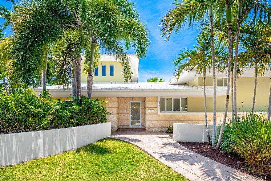 Waterfront 4/5.5 home with dock in guard-gated Belle Meade with no bridges to Biscayne Bay features 75 ft of water frontage on the Little River Canal, all impact windows and doors, fully renovated in 2015. Custom kitchen with Quartz counters and large eat-in area, separate formal dining with wet bar. Entire 2nd story master suite with morning kitchen and custom dressing areas, master bath with jetted tub, separate huge shower with massage jets and rain shower, his & her vanities. Large guest suites each with walk-in custom closets and full baths. Full cabana bath, heated pool, dock and pergola. Attached 2-car garage, utility room with W/D and quartz counter, fourth bedroom with full bathroom attached to garage may be used as nanny quarters.  Property is also available for sale.