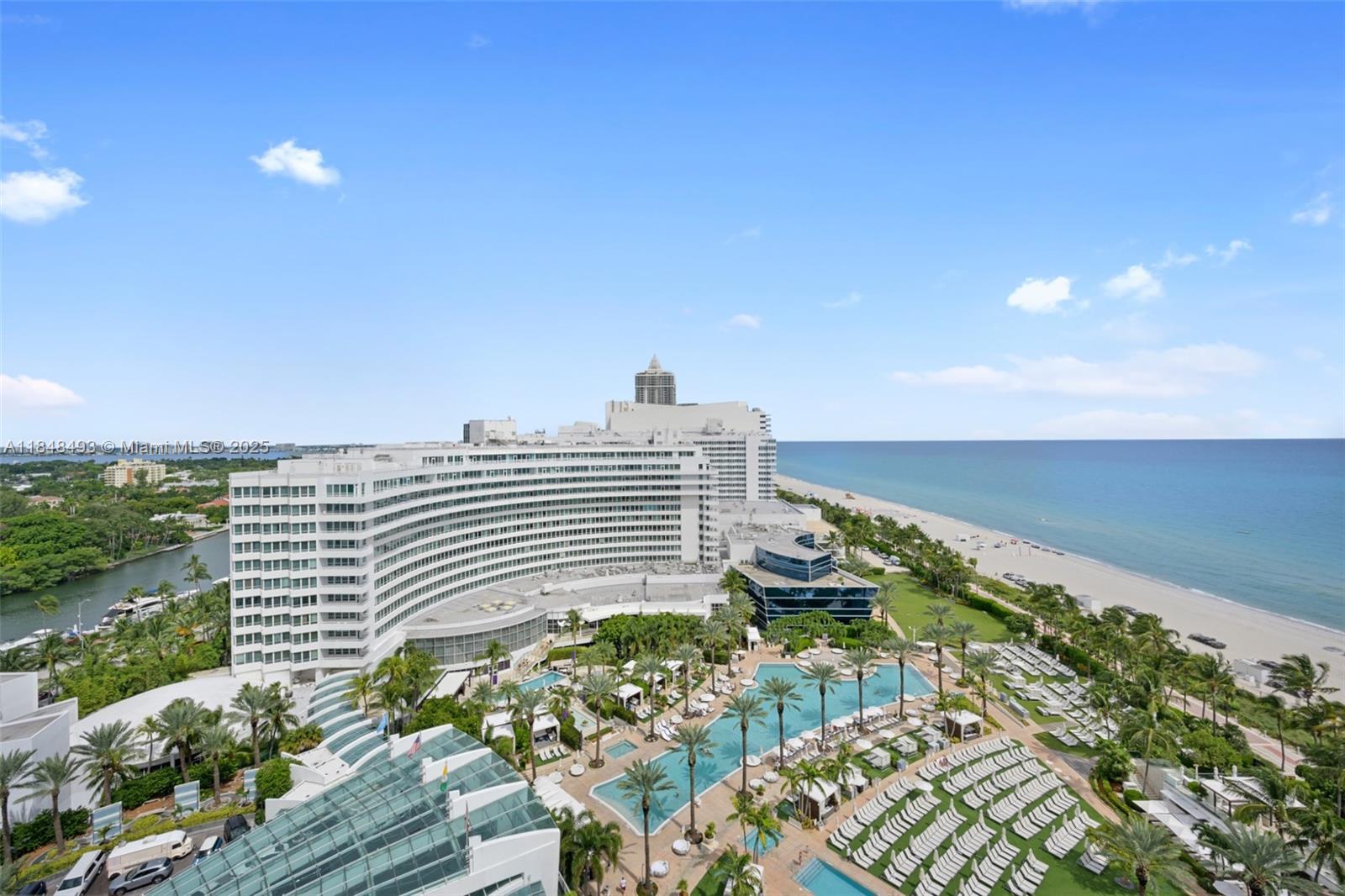 Located at the iconic Fontainebleau Resort. This lovely Jr Suite offers breathtaking views of the ocean with north and east views from a private balcony with unlimited views of the hotel pool and grounds. Unit includes turnkey furnishings with a king bed plus a sleeper sofa for additional guests. The Fontainebleau Resort offers fantastic restaurants located off the breathtaking pool surrounded by cabanas on the 22 oceanfront acres in Miami Beach, & notable fine-dining restaurants, a fabulous artisanal bakery & gelato cafe, a legendary bar situated in the main hotel lobby, shops, & so much more. Owner has the option of placing the property in the Hotel Program as income property. Owners enjoy access to Lapis Spa, amenities that include a private lounge exclusively for owners.