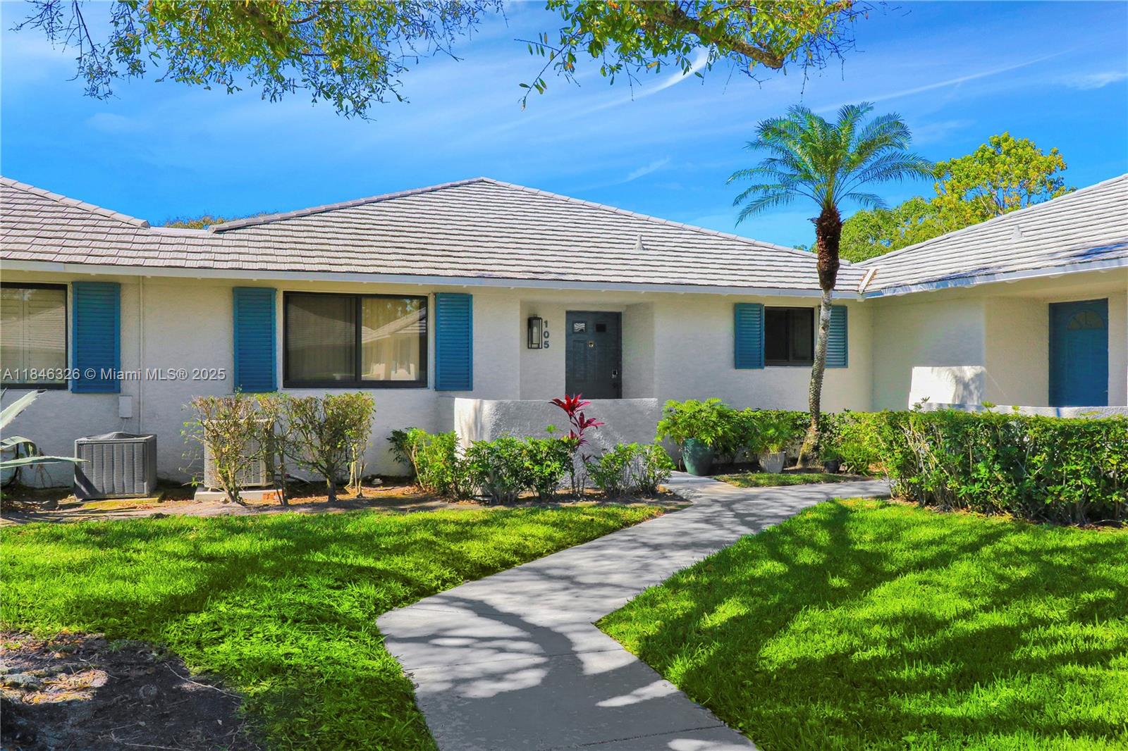 Welcome to this well cared for, clean and renovated residence located at 105 Club Drive in the prestigious PGA National community. This spacious open floor plan offers a light-filled living space adorned with high ceilings and updated finishes throughout. The clean, renovated kitchen with island seating is well equipped with all your cooking needs. The primary bedroom has a king bed, ensuite and large walk-in closet. Guest room has two double beds, and is right off the second full bathroom for guest conveniences. Washer/dryer in unit. Back patio offers a peaceful setting for dining al fresco or relaxing in the beautiful Florida weather. Just 15 Minutes from Juno beach and PBI airport and walking distance to PGA National Resort and Spa. Gaurd Gated community.