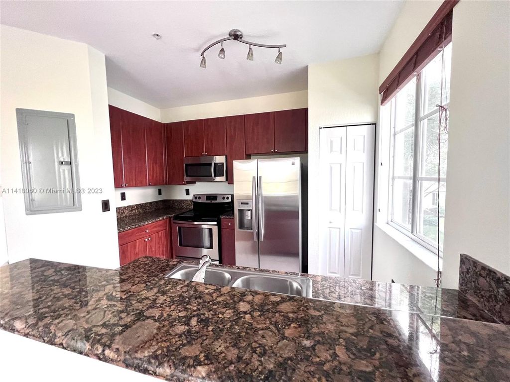 Photo of 12421 SW 50th Ct #347, Hollywood, FL 33027 (MLS # A11410060)