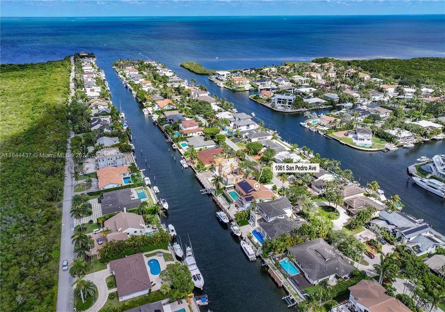 Completely renovated custom home of prime waterfront with direct ocean access, no bridge to bay! This newly refurbished 5 bedroom of over 5000 SF luxury living, features 100 ft water frontage w/new dock, boat lift! Graciously appointed with the highest attention to detail. Inviting and easy floor plan with all current modern features and comforts! Two master suites, marble floor, all impact windows & doors. Gourmet Epicurean kitchen equipped w/ top of the line appliances centered around island counter! Luxurious and pretty baths! All en-suite bedrooms w/ vistas! Stunning pool/patio w/ built-in outdoor grill. New roof, integrated w/ automation, Sono, Lutron systems, security camera! Energy efficiency w/solar panels in the process! Guard-gated community! Truly special! Incredible offering!