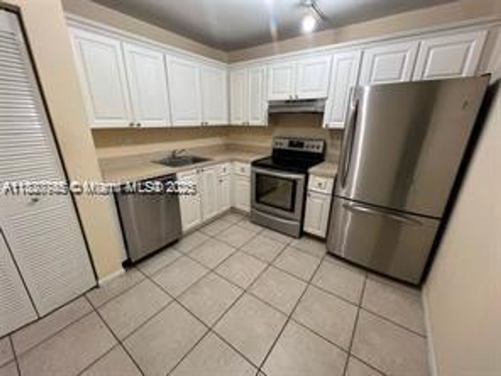 Photo of 721 N Pine Island Rd #121, Plantation, FL 33324 (MLS # A11820745)