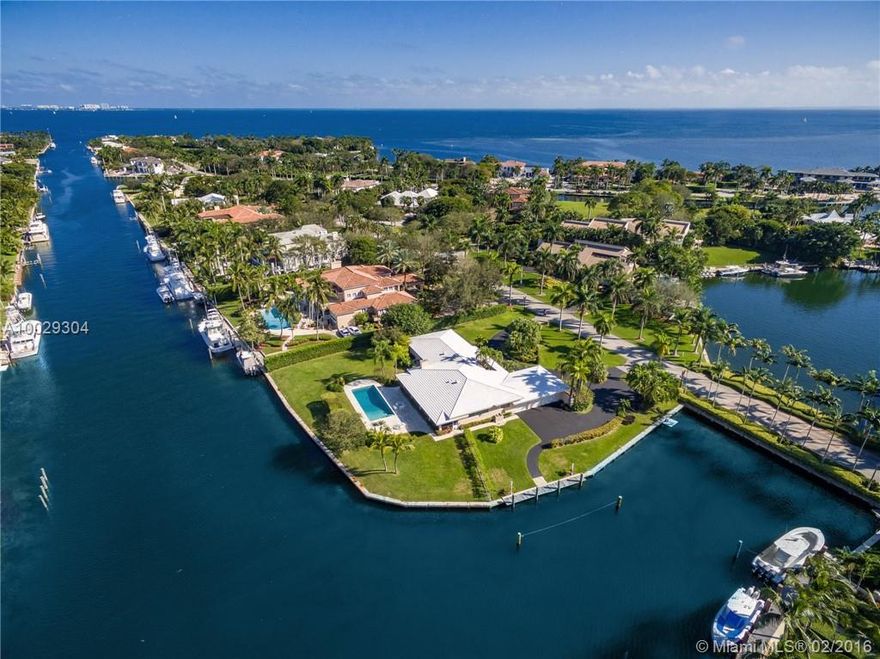 Boasting 370 feet of sweeping waterfront views, this amazing one-of-a-kind rare corner lot is located in the coveted gated community of Gables Estates.  Direct ocean access with no bridges and a deep boat basin, this lot is perfect for parking the grandest of yachts. Incredible opportunity to build your dream home in this highly sought after community.