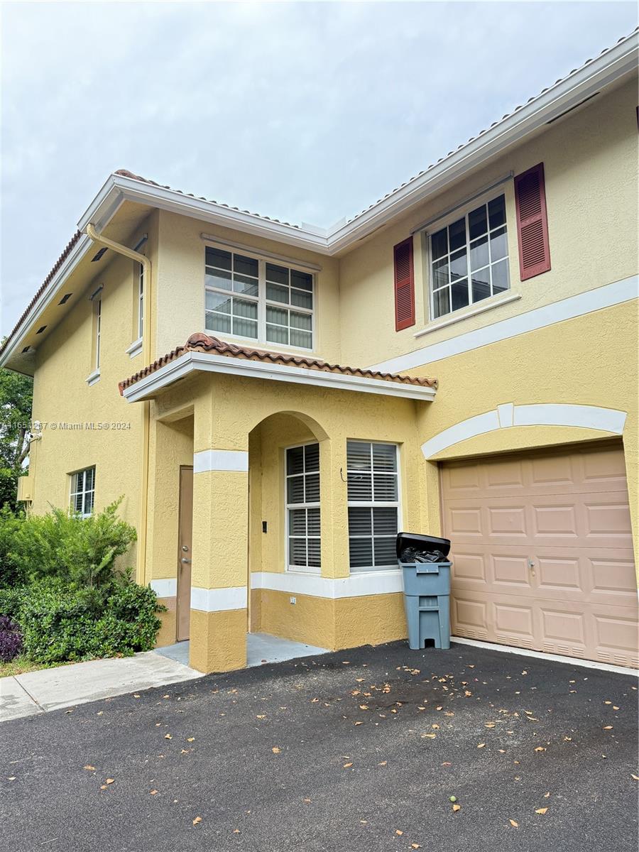 Discover this beautiful 2-bed, 2-bath, + den, one story townhome in a secure, gated community just south of the sought-after Miami Shores. Featuring modern porcelain floors in the living areas and bamboo flooring in the bedrooms, this home offers stylish comfort. The updated galley-style kitchen comes with granite countertops, white cabinets, and a convenient breakfast bar, perfect for casual dining. The converted garage provides flexible space for a home office, playroom, gym, or extra storage. Enjoy outdoor living with a private garden patio, ideal for grilling and entertaining. Centrally located near US 1, this townhome is within walking distance to shopping centers and close to major roadways, offering easy access to all of Miami. Don't miss out on this fantastic opportunity!