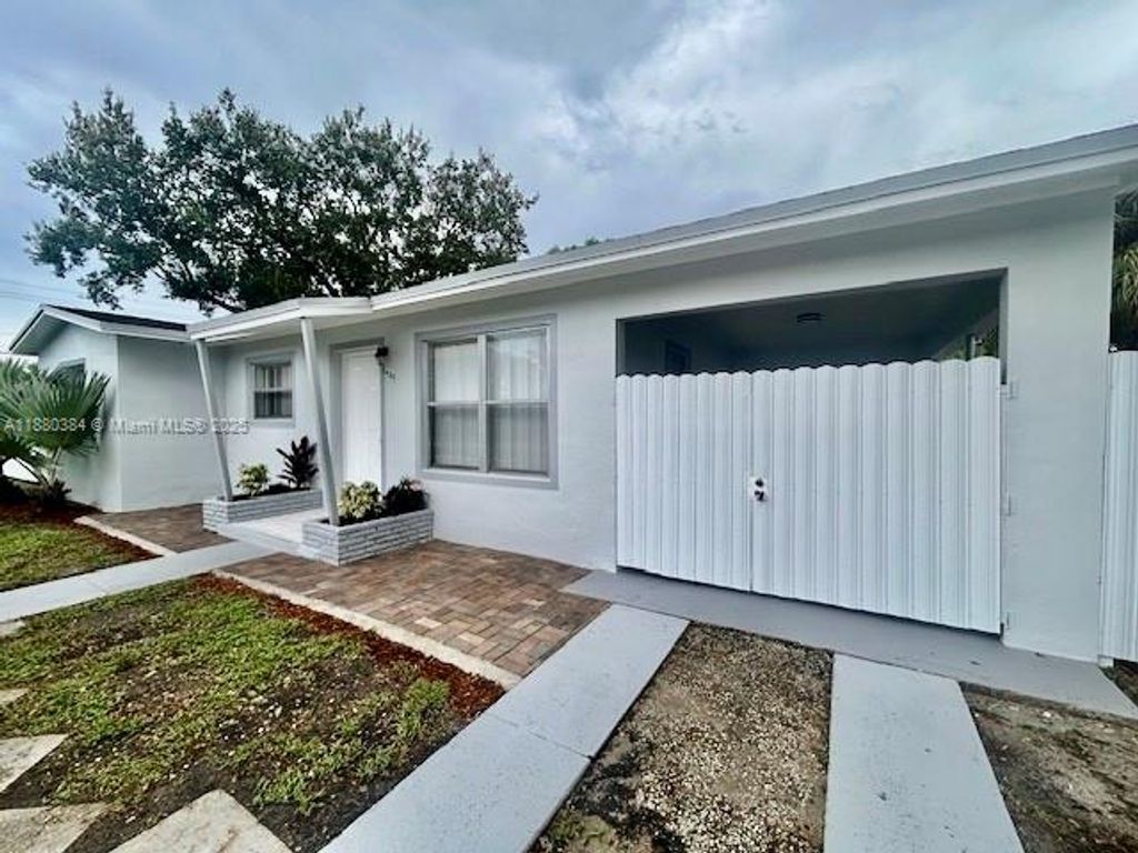 Photo of 3420 NW 2nd St, Lauderhill, FL 33311 (MLS # A11880384)