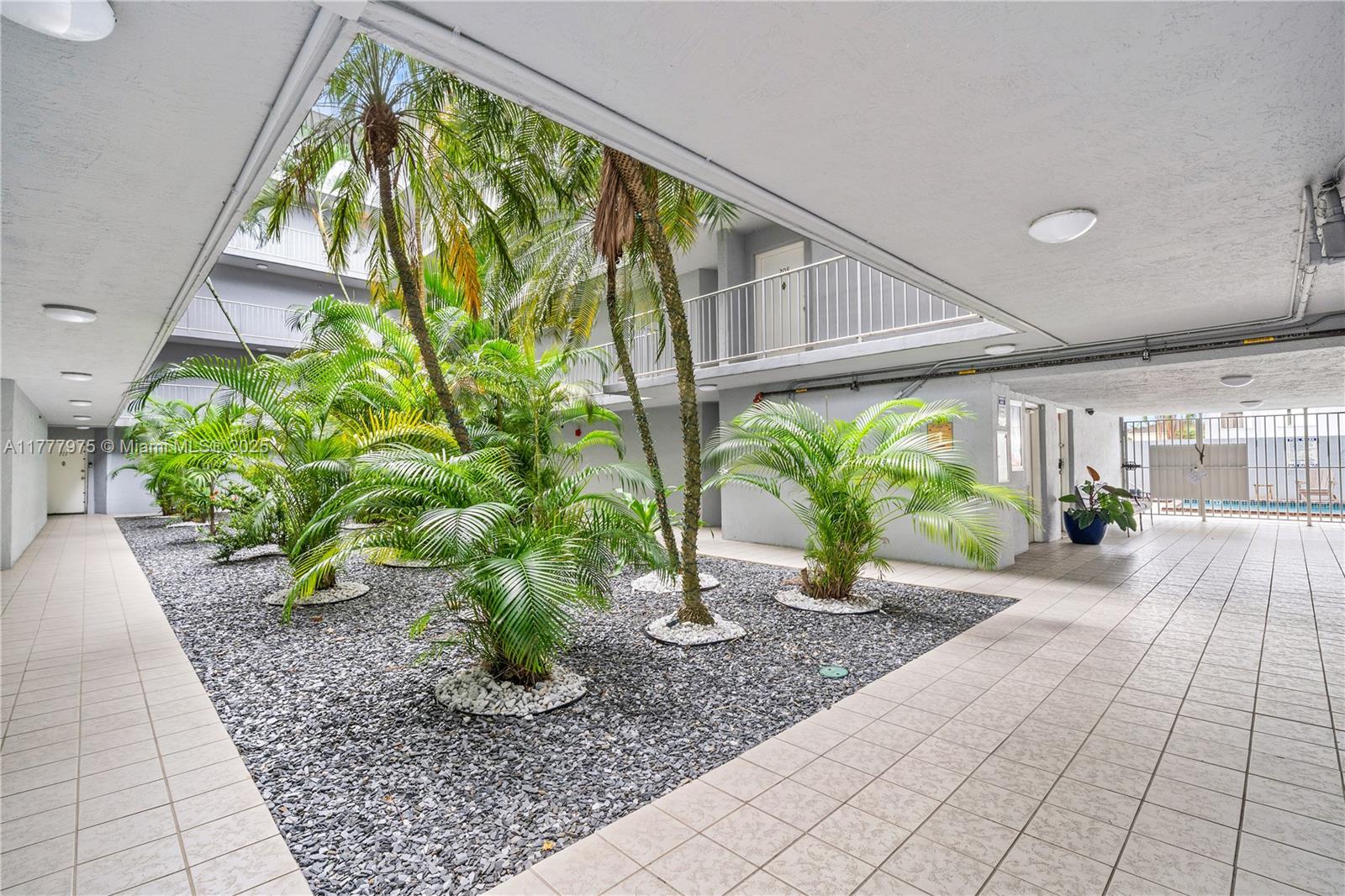 PALM COURT OF MIAMI CONDO - Residential