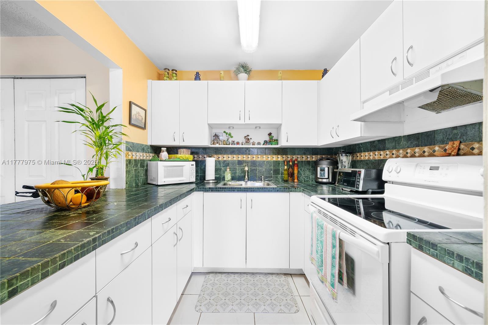 PALM COURT OF MIAMI CONDO - Residential