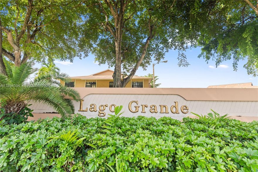 Largest model in Lago Grande! Do not miss the opportunity to enjoy this beautiful recently renovated 4 bedrooms with one bedroom downstairs) and 3 full baths townhouse in a great location.  Upgraded kitchen with granite countertops and stainless-steel appliances, high quality engineered grade vinyl floors, upgraded bathrooms, zebra blinds, scenic lighting, spacious rooms with plenty of natural light, new AC, accordion shutters, large private patio area with summer kitchen area, and more! See broker remarks or call agent regarding 5% conventional loan availability for this condo.