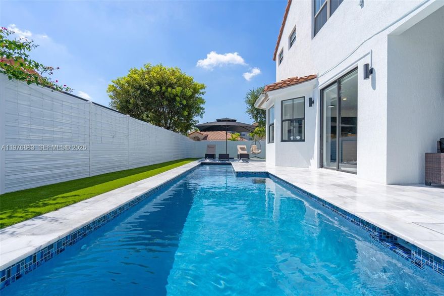 WELCOME HOME TO THIS INCREDIBLE PROPERTY OFFERING RESORT STYLE AMENITIES, 4 BEDROOMS, WITH 1 BEDROOM ON THE FIRST FLOOR, 3 BRAND NEW BATHROOMS, HIGH CEILINGS, IMPACT WINDOWS, SUMMER KITCHEN, 2 CAR GARAGE, AND AMPLE SPACES ALL AROUND. FROM THE MOMENT YOU WALK IN, YOU WILL NOTICE THE ATTENTION TO DETAIL IN EACH CORNER. WITH A STUNNING INFINITY POOL, JACUZZI AND SUMMER KITCHEN, THE POSSIBILITIES TO ENTERTAIN ARE ENDLESS. CLOSE TO ALL MAJOR HIGHWAYS, CONVENIENT SHOPPING CENTERS AND A+ SCHOOLS. IF YOUR LOOKING FOR A FOREVER HOME OR PERFECT INVESTMENT, THIS PROPERTY IS FOR YOU.