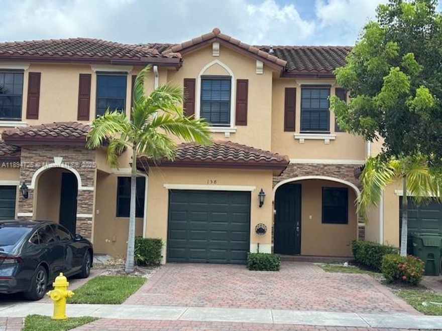 Beautiful remodeled townhome in Fresno at the Vineyards, a gated community in Homestead with 3 bedrooms and 2.5 bathrooms. Ceramic tile downstairs and wood laminate upstairs. One-car garage and fenced in backyard. Enjoy fully fenced backyard with gazebo , outdoor tiles over a concrete base. The community includes a clubhouse, fitness center, pool, water park, and playground. Close to the Turnpike, shopping centers, great schools, and Baptist Hospital. Ready to move in. Closing cost contribution using preferred Lender.