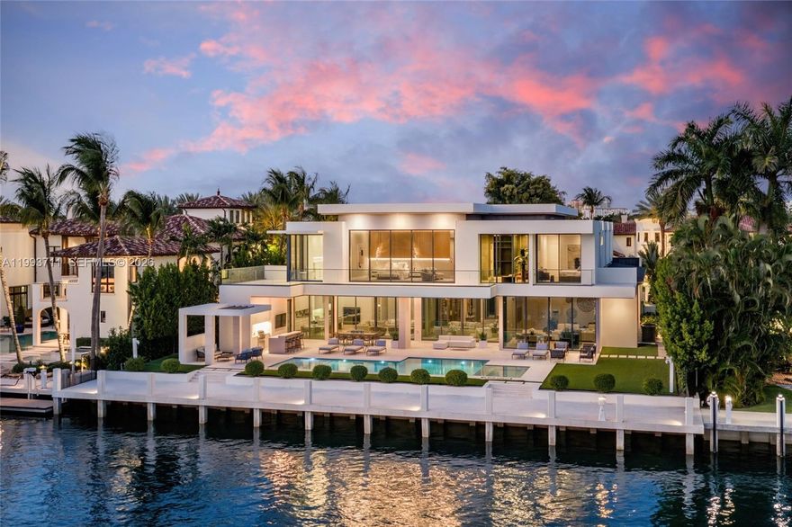 Set behind the gates of Harbor Beach, one of Ft Lauderdale’s most prestigious waterfront enclaves, this exceptional estate embodies a level of scale, privacy, and design rarely brought to market. Commanding 110 ft of deep-water frontage on a wide turning basin, the residence offers sweeping views and seamless yacht access with no fixed bridges, a setting as functional as it is striking.

Built by Sarkela Corp, the residence spans 8,725 square feet of interior living and 10,548 total square feet, offering 6 bedrooms, 7 full bathrooms, and 2 half baths - thoughtfully composed to balance grand entertaining and refined daily living. Designed by Randall Stofft with interiors by Italian D-Editors, the home is defined by expansive open spaces, walls of glass, and a seamless indoor-outdoor flow, fully embracing its waterfront position.

A chef’s kitchen with a dedicated prep area, formal dining room, and sophisticated club and media room create a polished yet effortless living experience. The primary suite is designed as a private retreat, complete with dual spa-caliber baths and custom wardrobes.

Outdoors, a resort-style pool and generous waterfront terrace unfold along the water’s edge, offering a setting that is both serene and connected to the yachting lifestyle synonymous with Harbor Beach. Located within the Surf Club community, with access to a private marina and beach club, this is a distinguished offering within one of South Florida’s most coveted waterfront addresses.