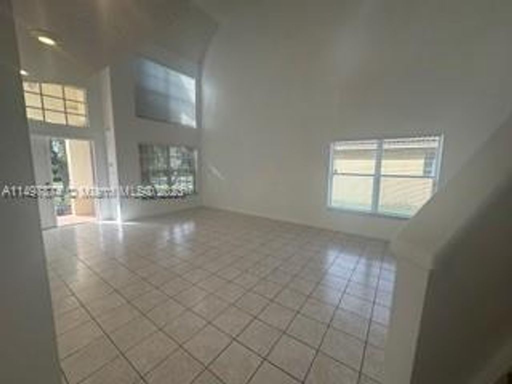 Photo of 20471 SW 1st St, Pembroke Pines, FL 33029 (MLS # A11497874)