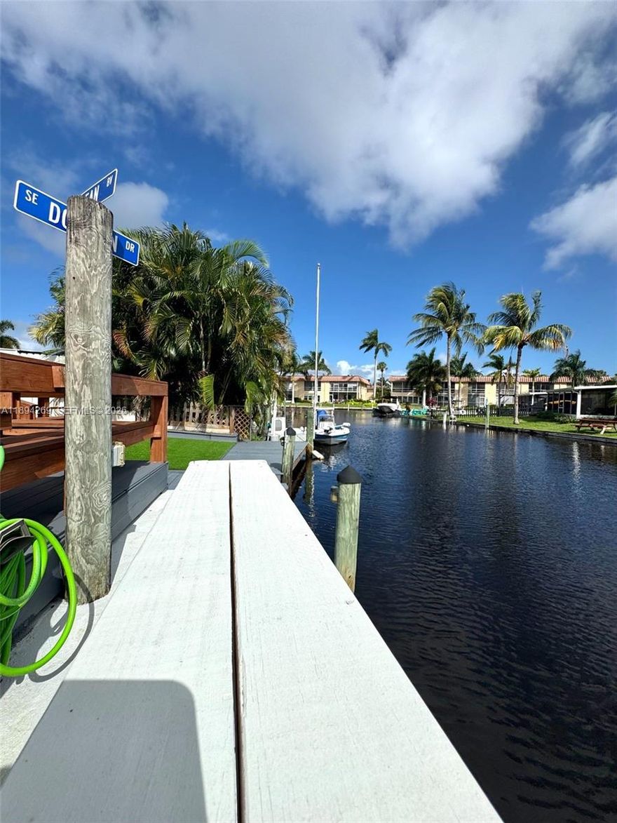 BOATER’S DREAM and exceptional investment opportunity! Rarely available 3-bedroom + office space, 2 bath waterfront home in Stuart featuring OCEAN ACCESS with NO FIXED BRIDGES and a private dock for boats up to 30 ft. Enjoy beautiful sunrise views from the fully fenced backyard perfect for morning coffee or entertaining outdoors.

This spacious half-duplex offers nice living area and a large kitchen, ideal for comfortable Florida living. Excellent location near restaurants, shopping, hospitals, and top rated schools, with easy access to I-95 (approx. 10-minute drive). No HOA park your boat trailer, cars in front of the property. Seller can consider owner finance 50% down balloon mortgage. Furniture also negotiable. Optional purchase boat 2019 Robalo 18' and trailer, inquire for details.