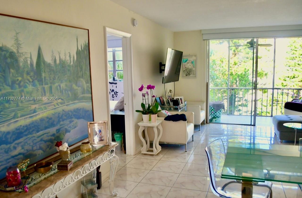 Relax in your updated patio while listening to birds, looking at magnificent Pinetrees & MAULE LAKE. Updated 1/1 at Point East over-55 community in Aventura. Lovely bright unit with a perfect amount of natural light. Secure walking path 2,5 miles. Heated swimming pool, 4other pools, billiard, ping pong, gym, saunas, Friday dance, twice-a-week yoga for free, plenty of clubhouse activities, bingo, 24/7 guard gated security, Close to shopping, banks and medical facilities, Aventura Mall, Bright Line Train station, Gulfstream Casino, and a short distance to the beach. Freebie rides & Aventura Shuttle that stops at every building in Point East. Well kept ,plenty storage area, assigned paking space ,got guest park, 50-year recertificate, maintenance with Reserves. TEXT to schedule your showing