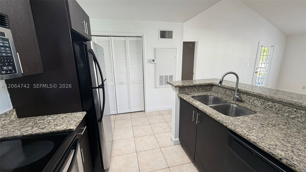 Photo of 4058 NW 87th Ave #4058, Sunrise, FL 33351 (MLS # A12064742)