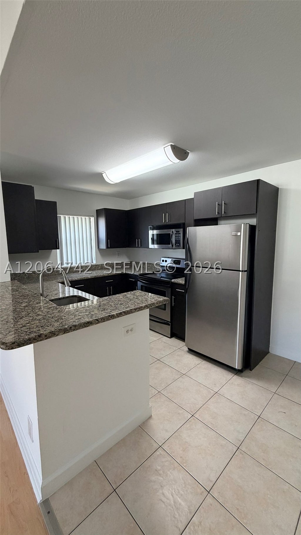 Photo of 4058 NW 87th Ave #4058, Sunrise, FL 33351 (MLS # A12064742)